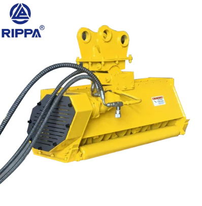 A brush cutter attachment used with an excavator.
